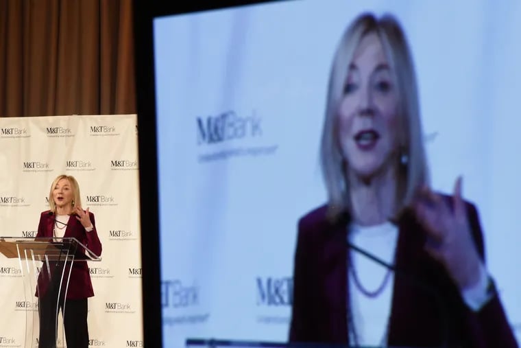 Amy Gutmann, president of the University of Pennsylvania, accepts her Inquirer Industry Icon Award in November. She serves on the Knight Commission, which released a report Tuesday on restoring faith in the media.
