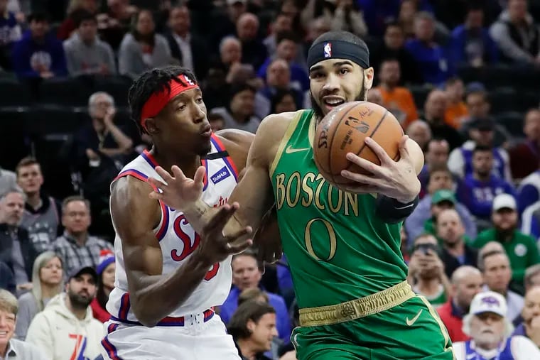 Boston Celtics forward Jayson Tatum drives to the basket against Sixers guard Josh Richardson on Thursday, January 9, 2020 in Philadelphia.
