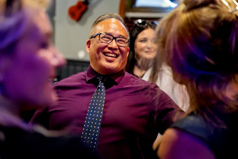 David Oh, Philadelphia's Republican nominee for mayor, greets supporters at his primary election night party in May.
