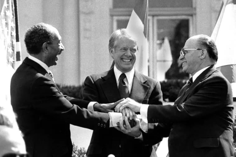 Anwar Sadat’s trip to Jerusalem paved the way for the Mideast peace brokered by President Jimmy Carter, and celebrated at the White House in 1979 with Israeli Prime Minister Menachem Begin.