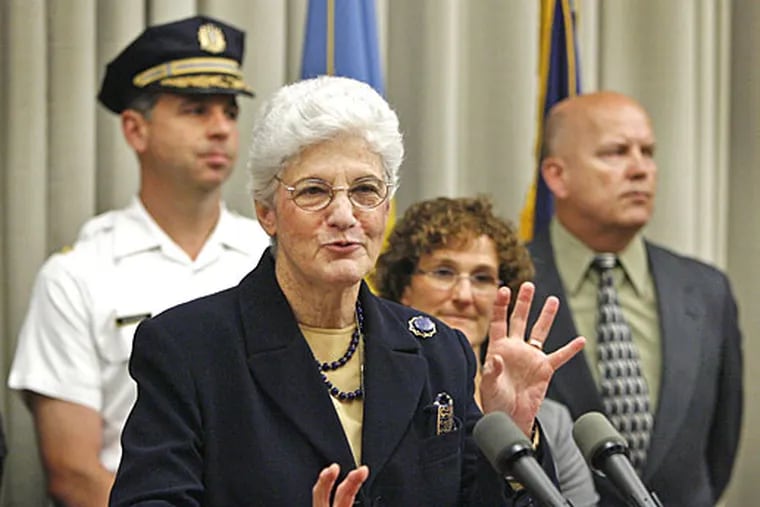 District Attorney Lynne M. Abraham announces the arrest of 18 individuals on charges of stealing money from LIHEAP and Crisis Program. Shown with Abraham are, from left, Philadelphia Police Chief Inspector Anthony DiLacqua, Philadelphia Inspector General Amy Kurland and Philadelphia Police Captain Joseph O'Donnell.