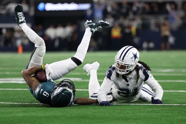 Dallas Cowboys cornerback Stephon Gilmore stops Philadelphia Eagles wide receiver DeVonta Smith after he caught the pass and the Eagles came up short on fourth down at AT&T Stadium on Sunday, Dec. 10, 2023, in Arlington, TX.