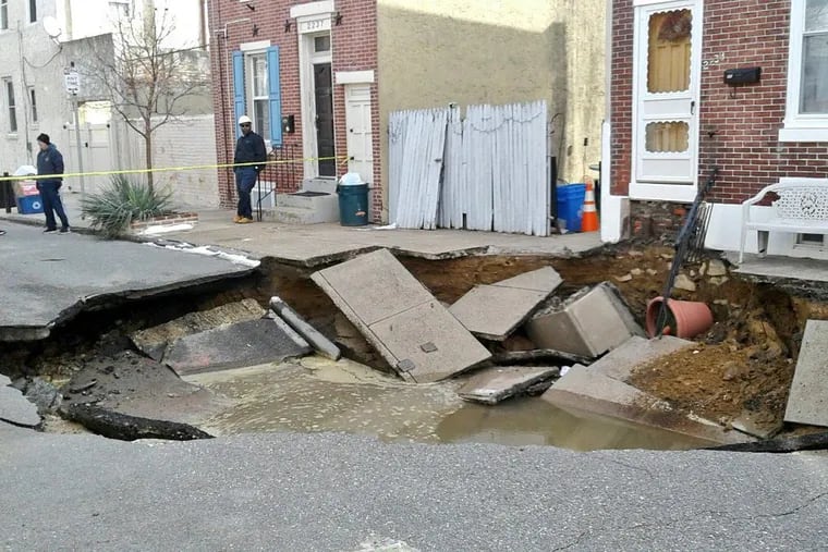 A 30-foot-wide sinkhole collapsed part of a Fishtown street on Friday. No one was hurt.