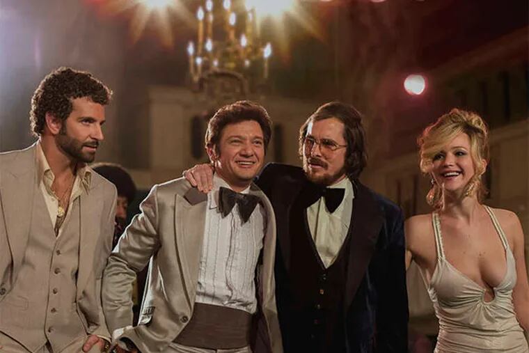&quot;American Hustle&quot;: (from left) Amy Adams, Bradley Cooper, Jeremy Renner, Christian Bale, and Jennifer Lawrence in David O. Russell's 1970s crime caper inspired by the Abscam scandal that brought down politicians, including some local ones. Dec. 18.