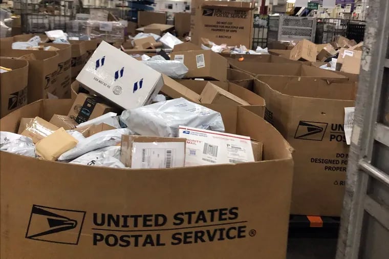 Hundreds of thousands of packages are piling up inside the U.S. Postal Facility in Philadelphia. Boxes filled with packages, some dated from before Thanksgiving, cover the floor of the city plant located in Southwest Philadelphia.