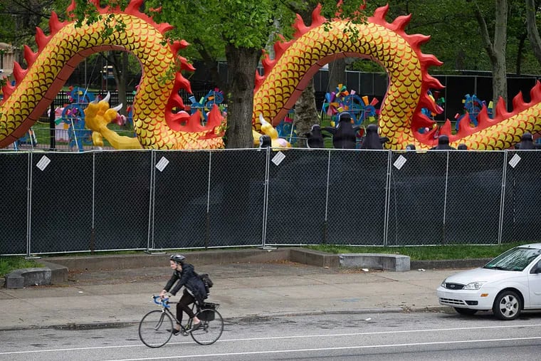 Franklin Square, a public park, was covered by tall fencing and tarps during the Chinese Lantern Festival in 2016.