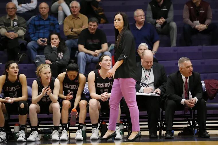 University of Sciences coach Jackie Hartzell (foreground) has her women's basketball program in the NCAA Division II top 10.