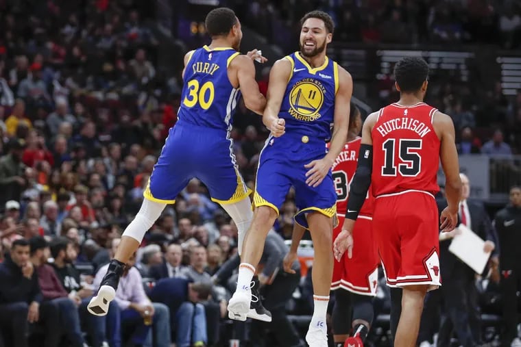 Warriors guard Klay Thompson went 14-24 from beyond the arc to set an NBA record in Golden State's 149-124 win over Chicago Monday night. Thompson finished with 52 points total.