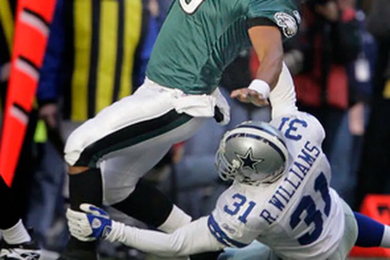 This tackle by Cowboys safety Roy Williams of Donovan McNabb proved costly to Williams - he was suspended for one game.