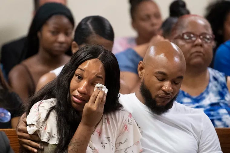 Darlene Perry and Curtis Jenkins, Jr., parents of late Curtis Jenkins III, react during the detention hearing for Jalen Carr, 22, of Sicklerville, in Camden County Superior Court. Carr is charged in a robbery linked to the murder of their son Curtis Jenkins III earlier this month.