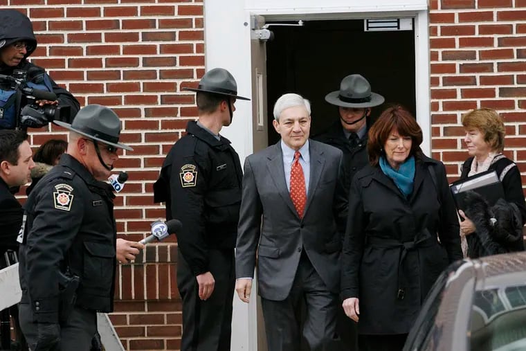 Former Penn State President Graham Spanier leaves a suburban Harrisburg courtroom, November 7, 2012, after his arraignment on charges in connection to the Jerry Sandusky sex abuse scandal. (Michael S. Wirtz/Staff)