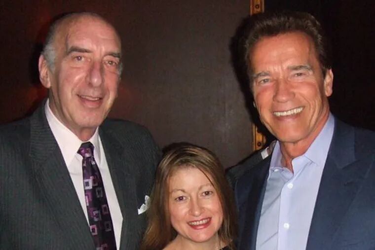 Gov. Arnold Schwarzenegger with pal Harry Jay Katz (left), Debra Renee Cruz at Mahogany cigar bar Monday.