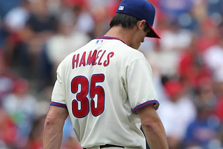 Cole Hamels suffered a contusion to his right hand after being hit by a line drive from Adrian Gonzalez. (David M Warren/Staff Photographer)