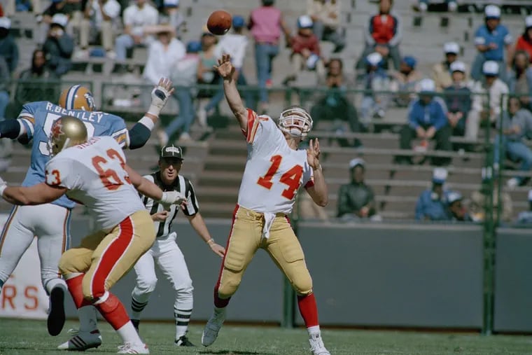 Quarterback Chuck Fusina throws a touchdown during a USFL game in 1985. The Philadelphia Stars played two season at Veterans Stadium before moving to Baltimore.