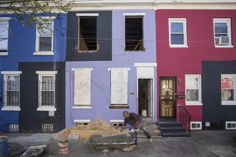 A house on the 3800 block of Melon Street  in the Mantua section of Philadelphia gets rehabbed. New Census data show that Philadelphia remains the poorest big city in America.