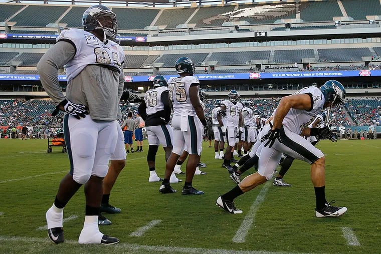 Eagles defensive lineman run during practice at Lincoln Financial Field.