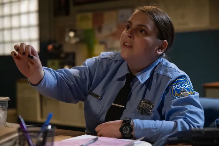 Beanie Feldstein stars as Philadelphia cop Sukie in 'Drive-Away Dolls,' a lesbian comedy out in theaters on Feb. 23, 2024. Credit: Wilson Webb / Working Title / Focus Features