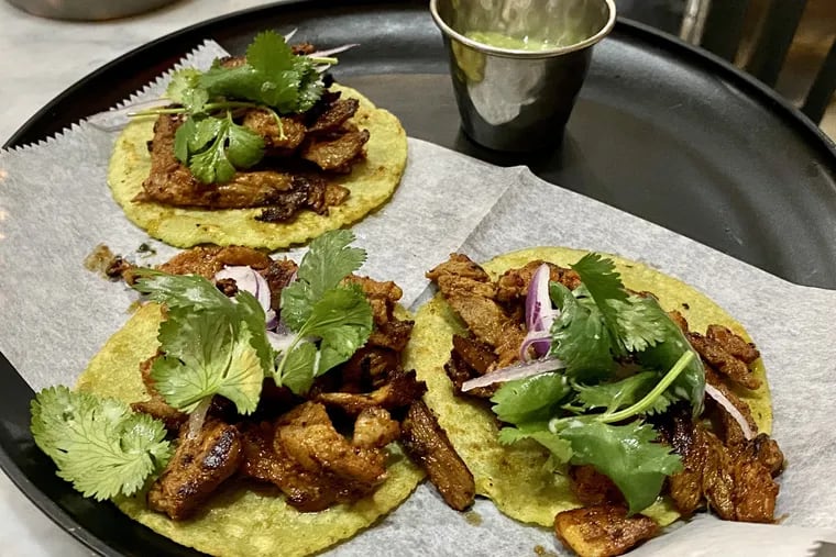 Tacos de trompo, a riff on tacos al pastor, at El Mezcal Cantina, 1260 Point Breeze Ave.
