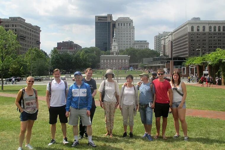 A recent tour group of a guide who does three 90-minute walking tours a day. The tourists are on &quot;the lawn,&quot; between Independence Hall and the Constitution Center. They are (from left) a Californian, three Germans, an Australian, and four Spaniards. CLARK DeLEON
