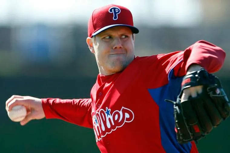 Jonathan Papelbon throws the baseball during spring training in Clearwater, FL on Monday, February 18, 2013. (Yong Kim/Staff Photographer)