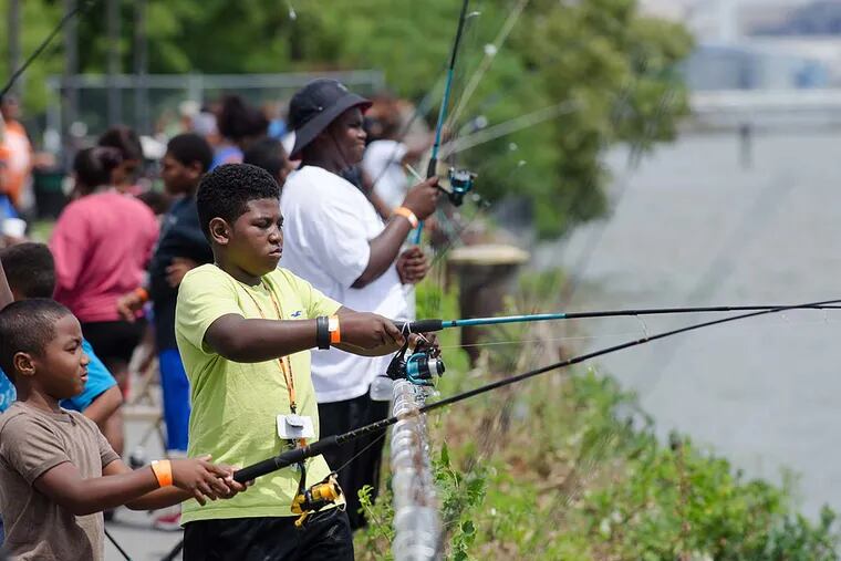 Young Chester fishermen at a city-sponsored event on the Delaware last year. Cabela's and other business sponsors are funding a national catfishing tournament in Chester this Saturday June 18, including a "youth fishing rodeo" for children 12 and under, from 8-11 a.m. at Ethel Waters Park, Chester.