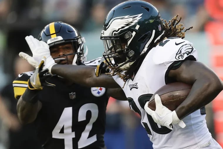 Eagles running back Jay Ajayi stiff arms Pittsburgh Steelers defensive back Morgan Burnett during the first-quarter in a preseason game on Thursday, August 9, 2018 in Philadelphia. YONG KIM / Staff Photographer