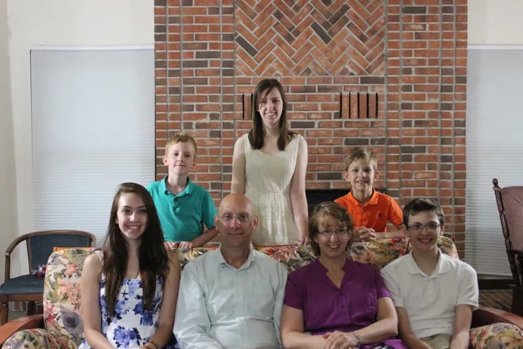 Celine Ryan, her husband Patrick and their five children in July. Seated from the left: Laurel, Patrick, Celine, Sean. Standing: Liam,  Holly and Declan.
