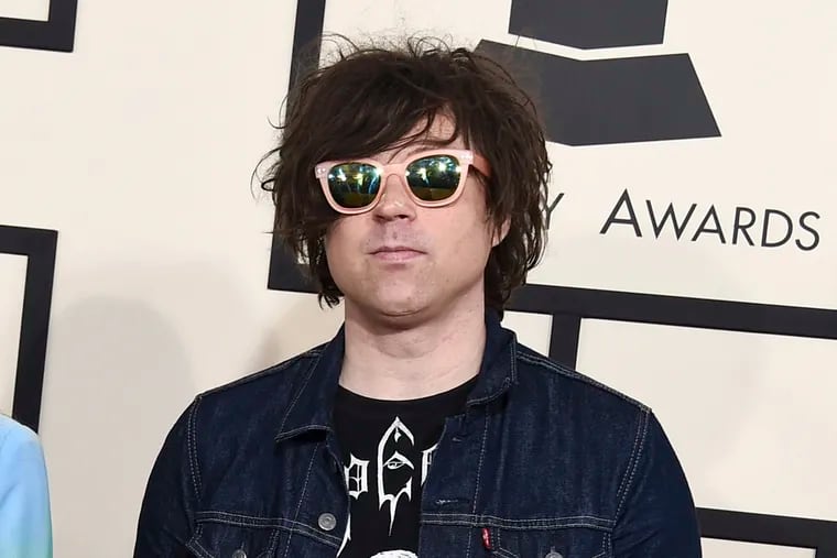 FILE - In this Feb. 8, 2015, file photo, Ryan Adams arrives at the 57th annual Grammy Awards in Los Angeles. A New York Times report says seven women have claimed Adams offered to help them with their music careers but then turned things sexual, and he sometimes became emotional and verbally abusive. In the story published Wednesday, Feb. 13, 2019, a 20-year-old female musician said Adams, 44, had inappropriate conversations with her while she was 15 and 16. (Photo by Jordan Strauss / Invision / AP, FIle)
