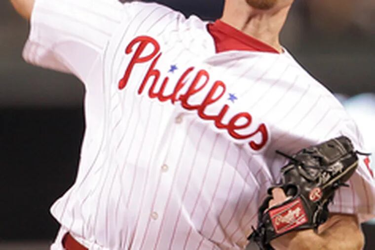 Brad Lidge earns his 14th save in as many opportunities.