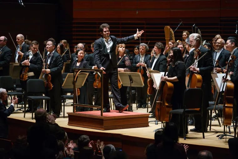 Lahav Shani and the Philadelphia Orchestra at the end of Thursday’s concert at the Kimmel Center.