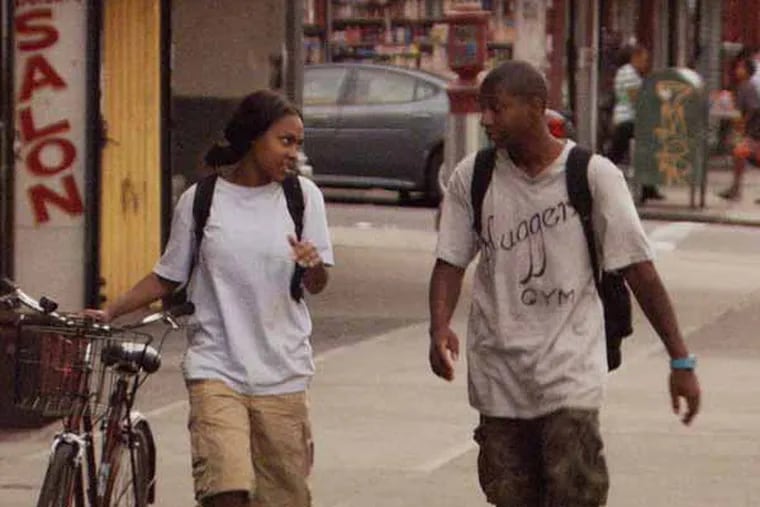 Malcolm and Sofia hatch a plan in GIMME THE LOOT.   Copyright: Seven for Ten, LLC, an IFC Films release.