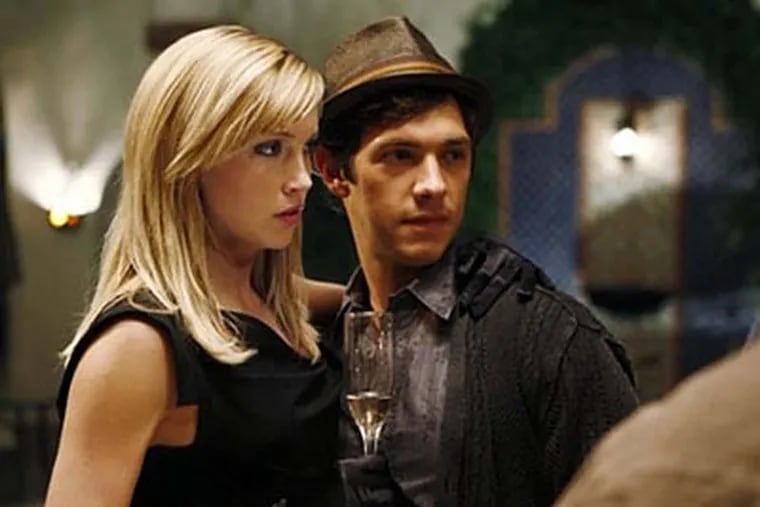 Katie Cassidy (left) is out to get Michael Rady (right) for herself.