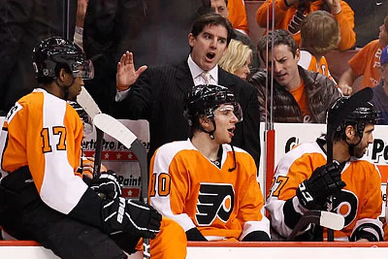 Flyers coach Peter Laviolette says his team is ready to step up in the playoffs. (Yong Kim/Staff file photo)