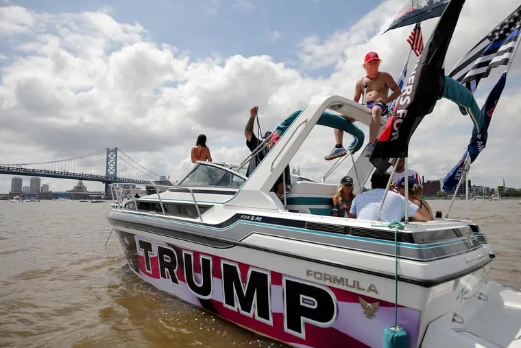 Trump supporters cruise the Delaware River on Aug. 8, 2020. Several hundred boats participated in the parade from just north of the Benjamin Franklin Bridge, and headed south to near West Deptford, N.J.