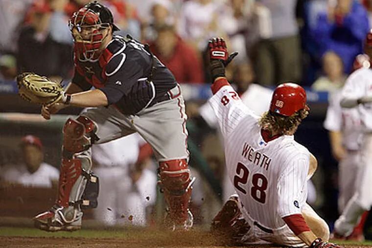 Jayson Werth beat the throw home to score the only run of the game in the eighth inning. (Yong Kim/Staff Photograher)