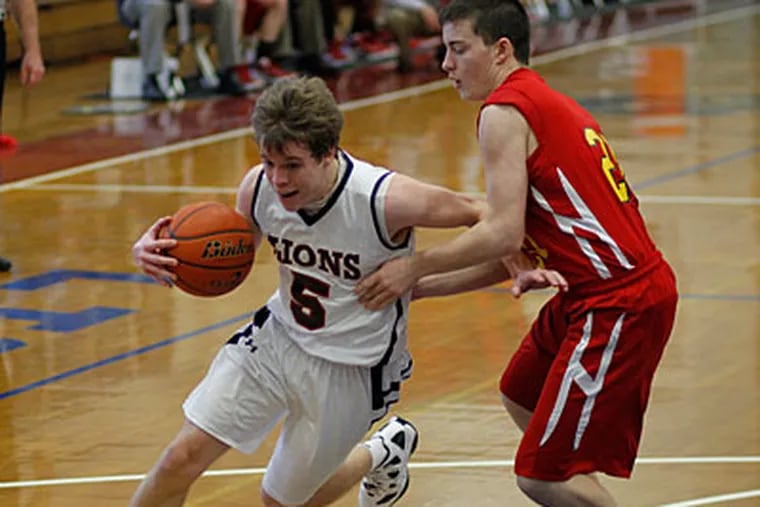 Cardinal O'Hara's Pat Hagenbach tries to drive past Haverford's Matt Donnelly.(Michael S. Wirtz/Staff Photographer)