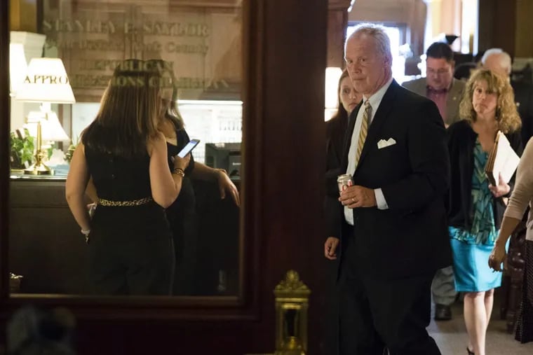 Pennsylvania House Speaker Mike Turzai leaves a committee meeting at the State Capitol.