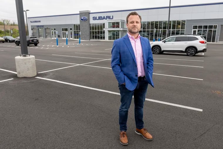 Jeff Glanzmann of Glanzmann Subaru, 1001 S York Rd, Hatboro, stands in a section of the car lot where new cars should be displayed.