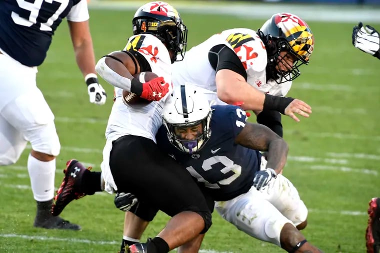 Penn State linebacker Ellis Brooks tackles Maryland running back Isaiah Jacobs on Nov. 7.