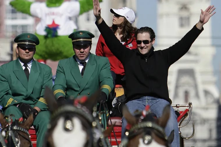 Pat Burrell, just named to the Phillies' Wall of Fame, rides the Budweiser Clydesdale wagon that led the victory parade held after the team won the World Series in 2008.