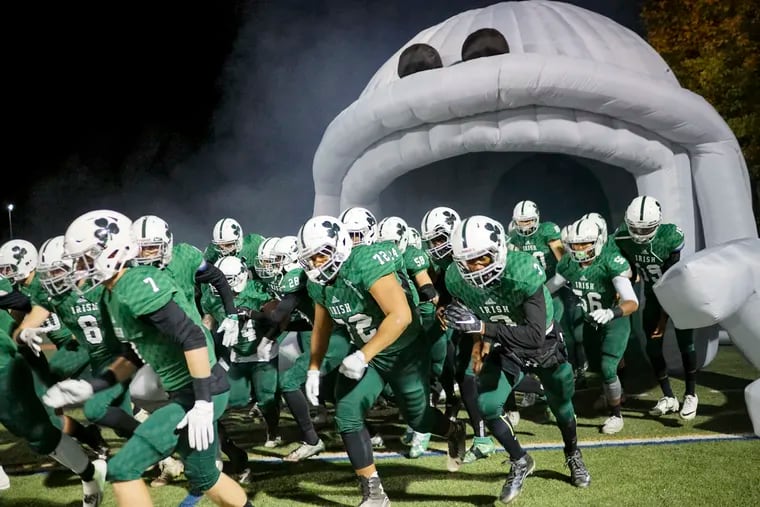 The Camden Catholic football team, here entering the field before a 2016 game, has opted along with fellow South Jersey non-public programs Paul VI and Bishop Eustace, not to participate in the state tournament.