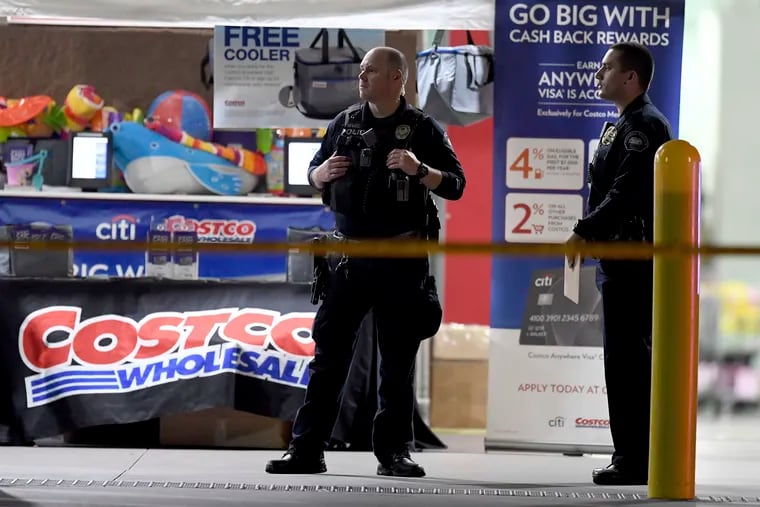The Corona police department investigate a shooting inside a Costco in Corona, Calif.,  Friday, June 14, 2019.  A gunman opened fire inside the store during an argument,  killing a man, wounding two other people and sparking a stampede of terrified shoppers before he was taken into custody, police said. The man involved in the argument was killed and two other people were wounded, Corona police Lt. Jeff Edwards said.  (Will Lester/Inland Valley Daily Bulletin/SCNG via AP)