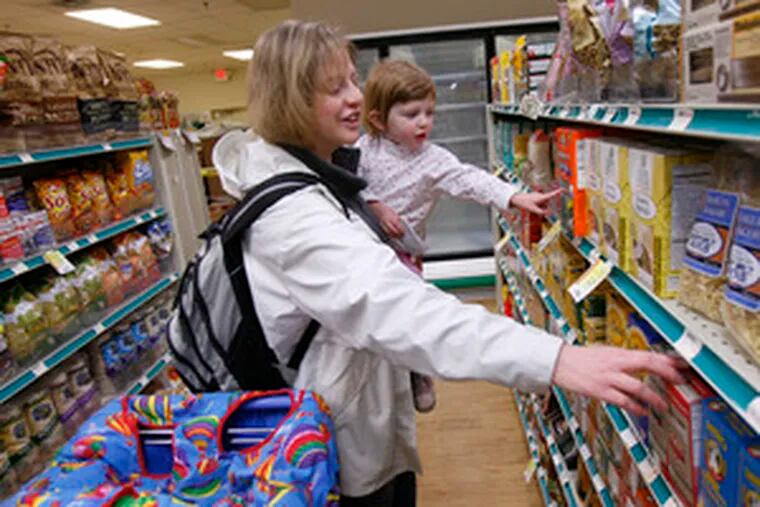 At Martindale&#0039;s Natural Market in Springfield, Jean Kintisch shops for foods that are safe for her daughter, Clara, who is allergic to milk, eggs and nuts.