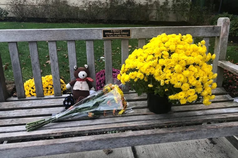 A small memorial rests on a bench outside of the Haverford Area YMCA, where a 2-year-old child was killed in the parking lot Saturday.
