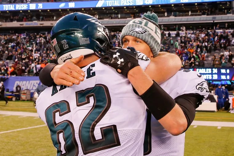 Everybody loves Nick Foles (right), who could be playing his final game as an Eagle on Sunday. A prohibitive contract for 2019 likely will have the Eagles looking elsewhere for Carson Wentz's backup. But there's still work to be done in 2018.