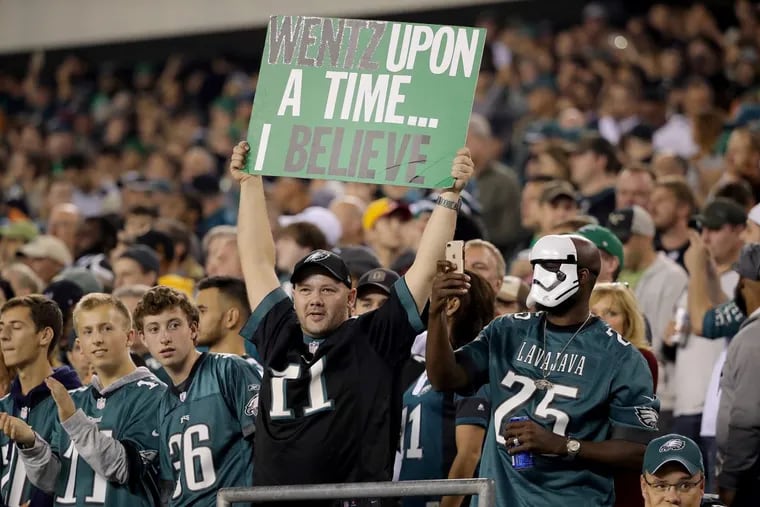 Eagles’ fans cheer as the Eagles play the Redskins in Philadelphia, PA on Monday.