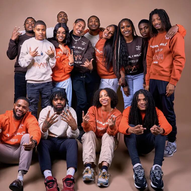 YouthBuild students and staff member Khalil Bullock (bottom left) pose at a photoshoot for the school's "I Can, I Will" social media campaign. The campaign will close out Black History Month and celebrate the school's young Black students.