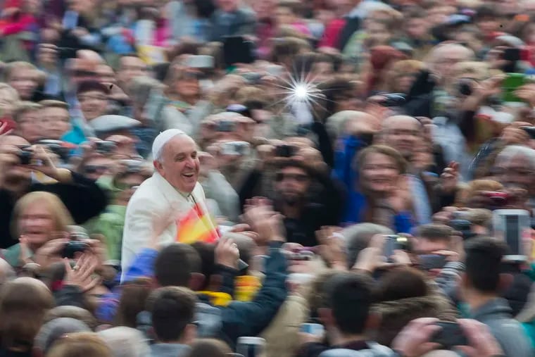 Pope Francis, in St. Peter's Square , has strong approval ratings in this country, and what he says on issues from abortion to climate and poverty could resound. ALESSANDRA TARANTINO / AP