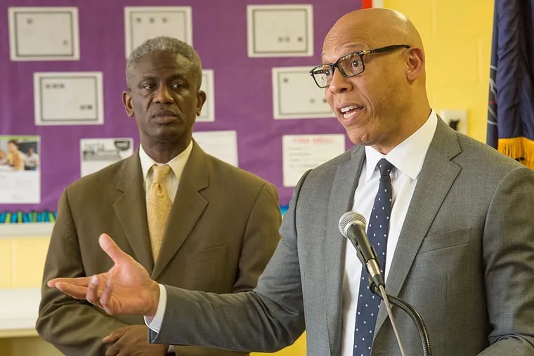 Superintendent William R. Hite Jr. (right) with Eric Becoats, in charge of Philadelphia schools’ Turnaround Network.