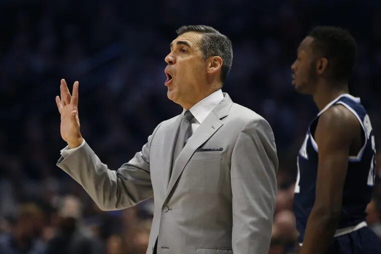 Villanova head coach Jay Wright gives instruction during the first half of an NCAA college basketball game against Xavier, Saturday Feb. 17, 2018, in Cincinnati.